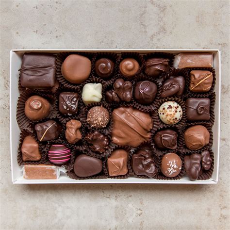 chocolate in metal box|assorted box of chocolates.